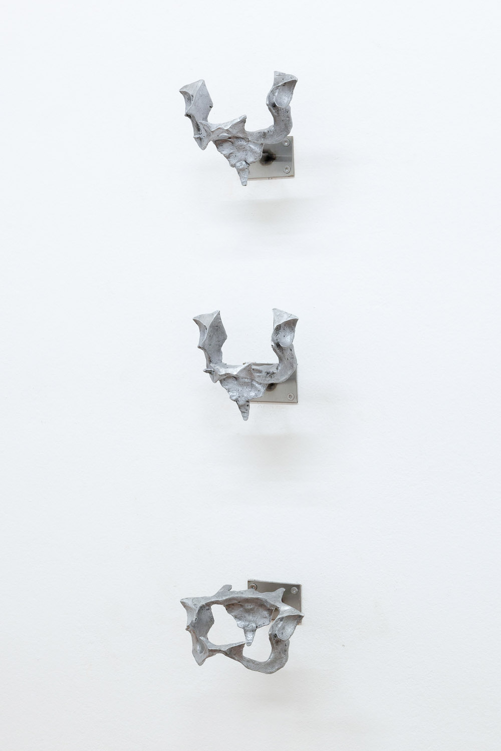 Ellie Hunter, Khora I – III, 2021. Cast aluminum and stainless steel. Exhibition view, Loggia. Photo: Flavio Palasciano.